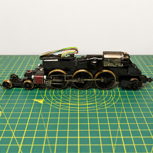 Model railway locomotive undergoing DCC conversion with wiring and decoder installation