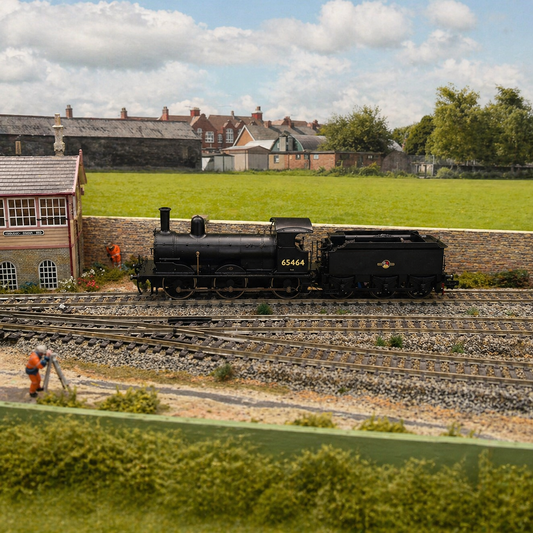 OO gauge locomotive serviced on workbench with cleaning, lubrication and performance testing